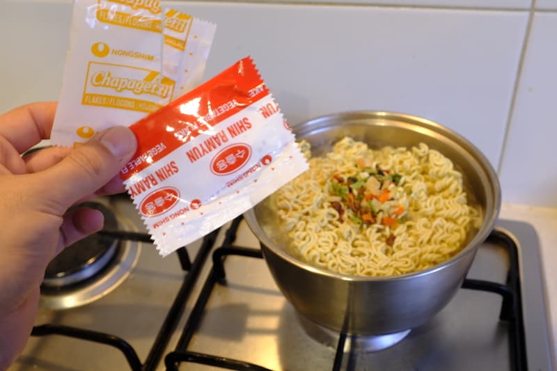 Vegetable packets in front of the stovetop